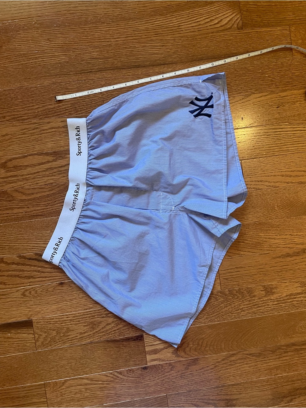 Sporty & Rich Light Blue Women’s Athletic Shorts with White Elastic Waistband